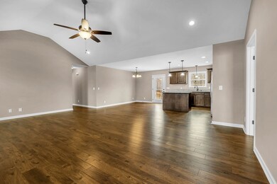 Seamlessly connected to the kitchen through an open floor plan, this living area invites both relaxation and sociability, offering a perfect blend of modern elegance and functionality.  418 N Ballard Rd  Manchester, TN 37355