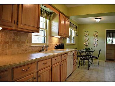 Kitchen. Updated kitchen with corian countertops a