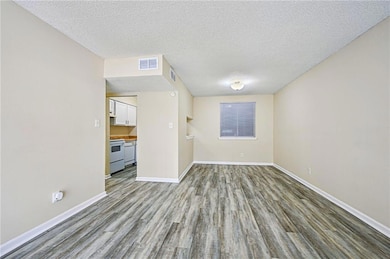 Living Room, Dining area and entrance to Kitchen.