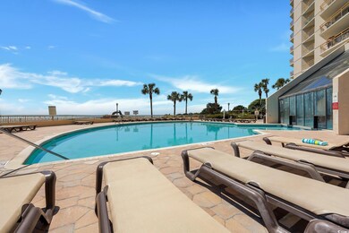 Community pool featuring a patio area