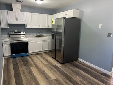 Kitchen with stainless steel appliances, under cab