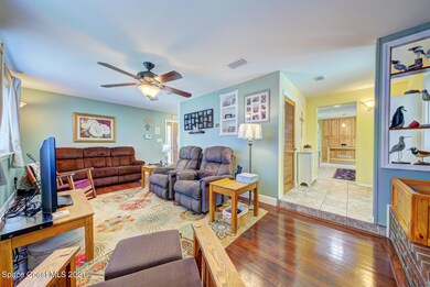 living room with fan