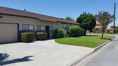 Side view of the home and plenty of parking