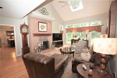 Family room w/wall of windows and skylight