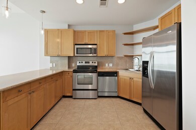 A closer view of the kitchen with its granite and