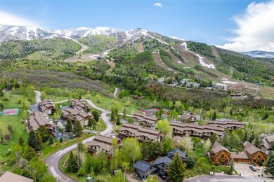 Aerial view of residential area featuring mountain