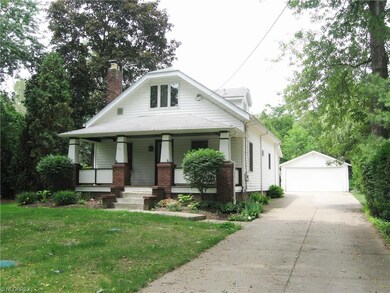 Craftsman style Cape Cod with concrete drive and 2