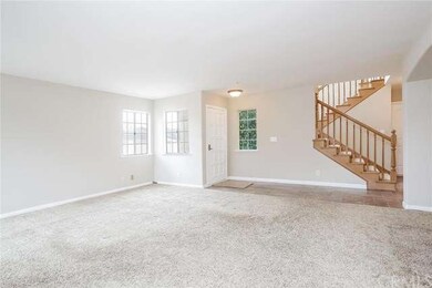 Front Door and open Living Room