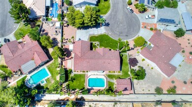 Look at this beautifully landscaped .45 acre lot w