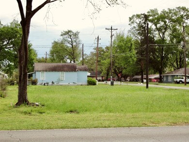 LARGE CORNER LOT...