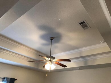 Lovely Trayed Ceiling in Living Rm w Cro