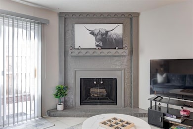 Living room featuring a wealth of natural light, l