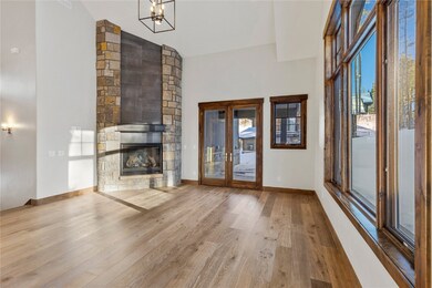 The vaulted ceilings and mountain modern fireplace