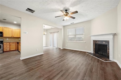 Unfurnished living room with dark wood finished fl