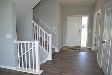 This beautiful entry will be spacious and bright. 