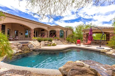 Pool and Ramada in Lush Desert Setting