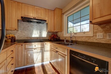 Kitchen looking out over your backyard
