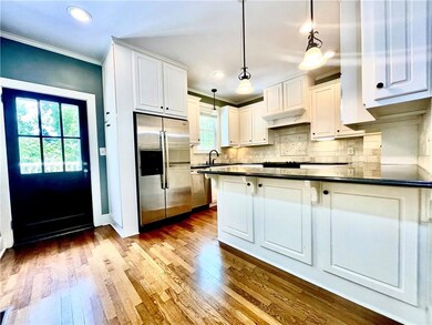 Kitchen featuring a healthy amount of sunlight, da