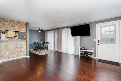 Living Room to Entryway and Dining
