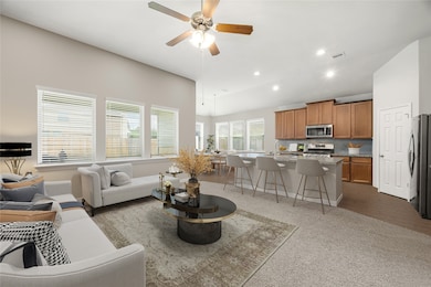 Gather, relax, and entertain with ease in this ope