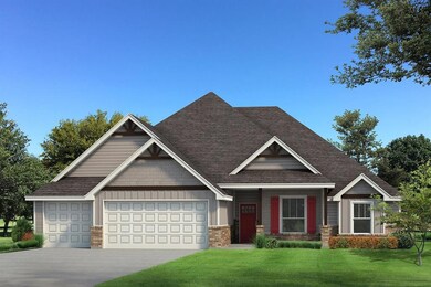 Craftsman inspired home featuring a garage and a f