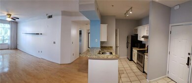 Pano view of Kitchen, Dining Area, Family Rm & Hall to Bath, W/D & Private Br