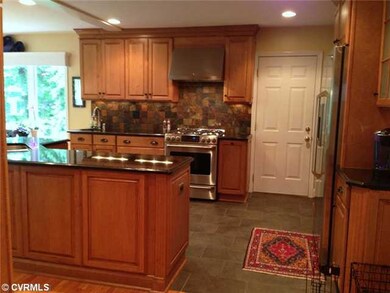 Kitchen - custom cabintrey, slate tile backsplash,