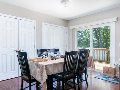 Spacious dining area with sliders to the deck