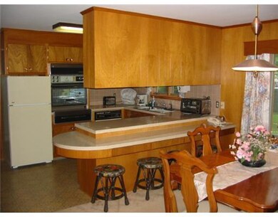 Kitchen. Standing in the dining room...