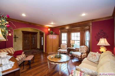 Lovely formal living room C/B formal dining room.