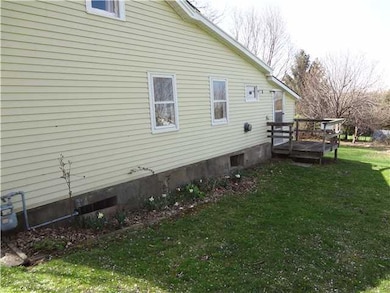 Exterior Back. Right side of the house. Gas meter 