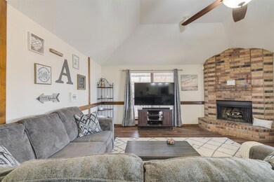 Living room with hardwood / wood-style flooring, c