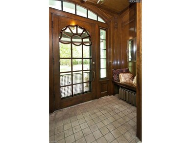 Front entrance has beautiful detail in both the do