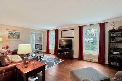 View 2 of the family room, flooded with bright nat