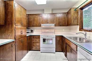 Updated Kitchen w/Hard Surface Counters