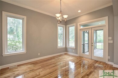 Spacious dining room with open concept and arched 