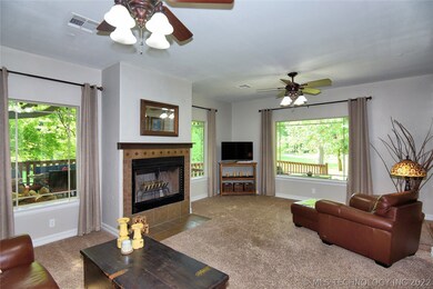 Spacious living room with wood burning fireplace,