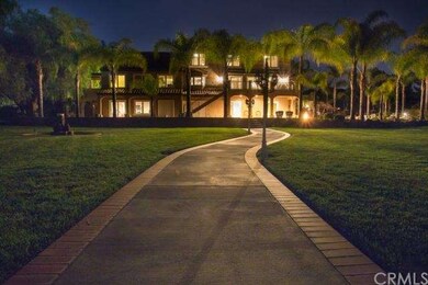 Evening view of the rear entrance of the estate hi