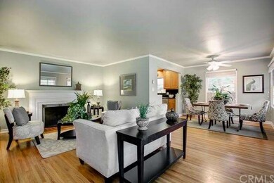 View of living room adjacent to dining area.