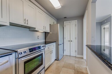 Kitchen showing pantry, fridge remains