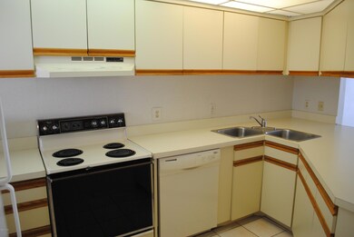 Kitchen w/ breakfast bar and ocean view