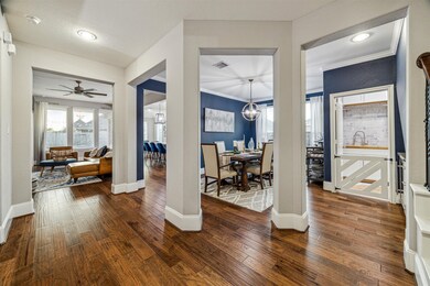 The dining area flows seamlessly to the living space
