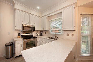 Kitchen window looks out onto backyard where your children will be playing