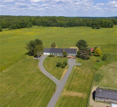 Beautiful landscape two driveways...
