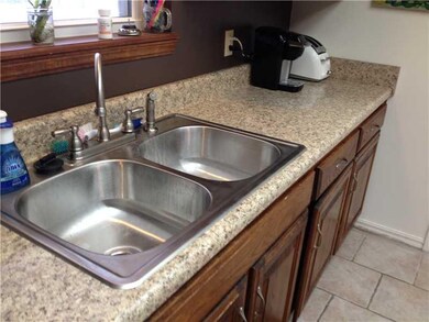 Kitchen. New countertops and stainless steel sink