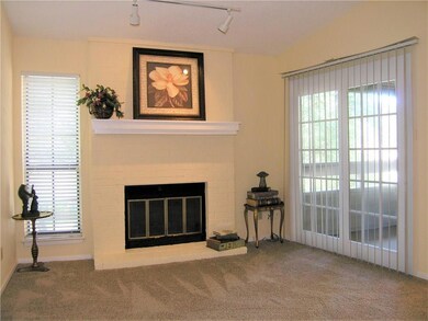 LIVING WITH FIREPLACE AND MANTLE-ATRIUM DOOR TO PA