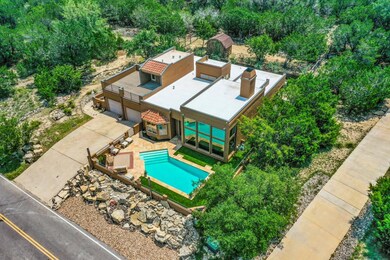 Aerial view of property and surrounding area with