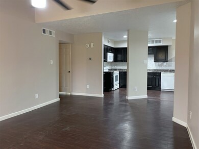 Living room connects into kitchen and breakfast no