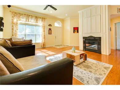 Living Room. The entry opens into a large, well-lit living space.  Notice all of the built-ins.  Storage abounds.