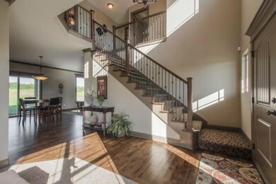 Front foyer. Wood floors. Open floor plan.